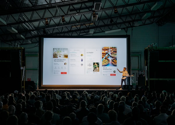 Simultaneous interpretation at a large conference with speaker on stage